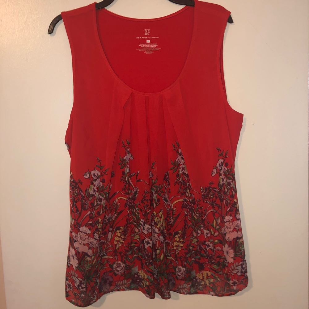 Red sleeveless top with a floral print
